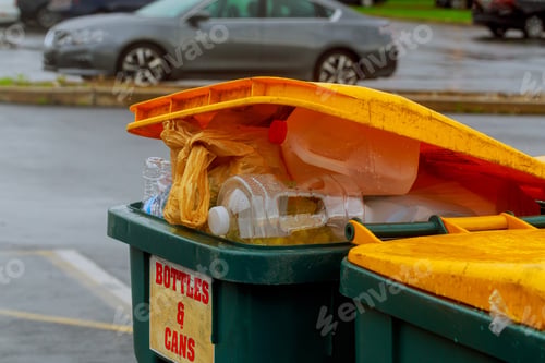 Preview: Overflowing garbage bins with household waste in the city Dumpsters being full with garbage
