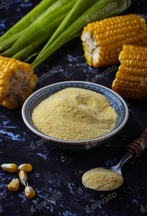 Preview: Corn grits and corncob on concrete background