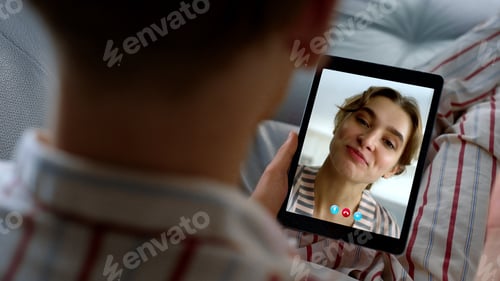 Preview: Closeup girl speaking web camera with guy. Distant happy couple talking online