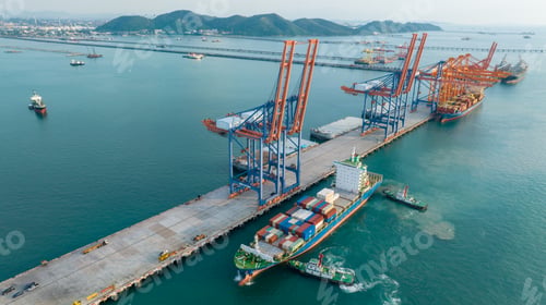 Preview: Tug boat pulling Cargo Container Ship into Cargo international sea port. Freight forwarding
