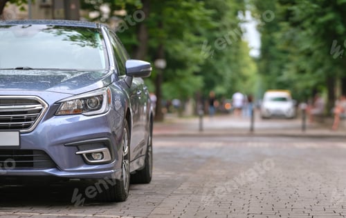 Preview: Close up of a car parked on city street side