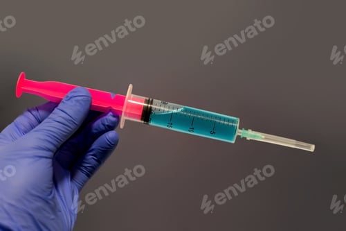 Preview: Syringe, medical injection into hands, palms or fingers. Medicine plastic vaccination equipment with