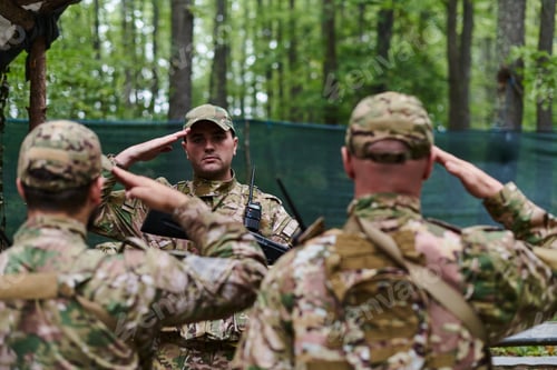 Preview: A dedicated soldier salutes his elite unit, showcasing camaraderie and readiness for the most