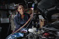 Preview: Mechanics inspect and check the refrigerant and fill the car air conditioner in the garage.
