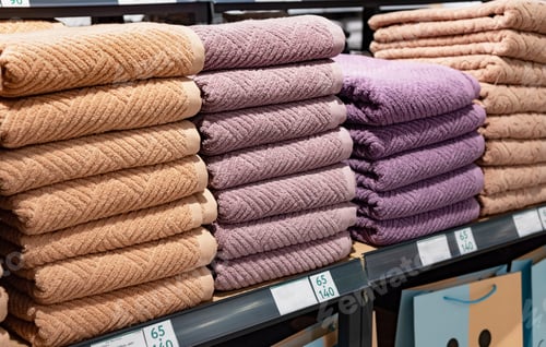 Preview: Multi colors Stack of bath towels. towels in a stack on the shelves in the supermarket. family shop