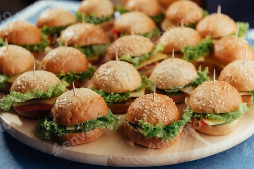 Preview: Delicious Appetizer Mini Burgers with Lettuce and Cheese