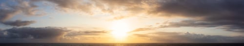 Preview: Dramatic Panoramic View of a cloudscape during a dark, rainy and colorful sunset