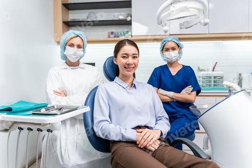 Preview: Portrait of Asian young woman patient and dentist at health care clinic.