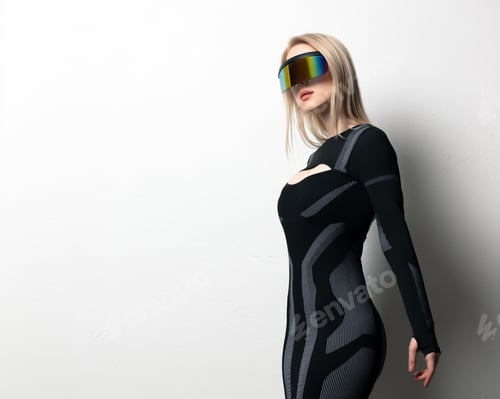 Preview: Blonde android female in VR glasses and suit on white background.