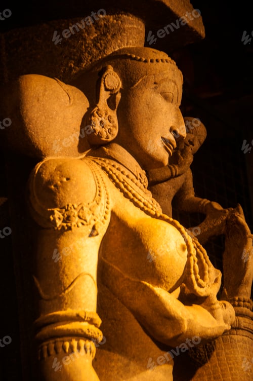 Preview: Carved sculpture of Hindu god and goddess at Meenakshi temple, Madurai, Tamil Nadu, India.