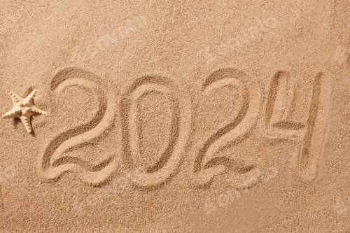 Preview: Happy New Year 2024 greeting card. The numbers 2024 on the sand on the beach
