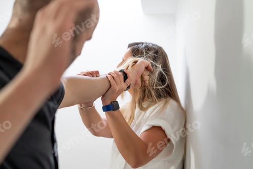Preview: A man mistreating a woman by pulling her hair