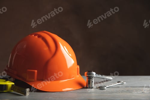 Preview: Different construction tools on white wooden table
