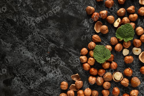 Preview: Healthy food and healthy nutrition concept, nuts - hazelnut