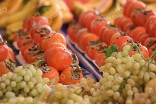Preview: Fresh ripe fruits on market counter.