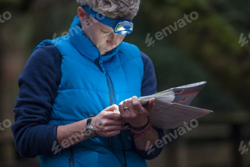 Preview: Focused individual engrossed in reading