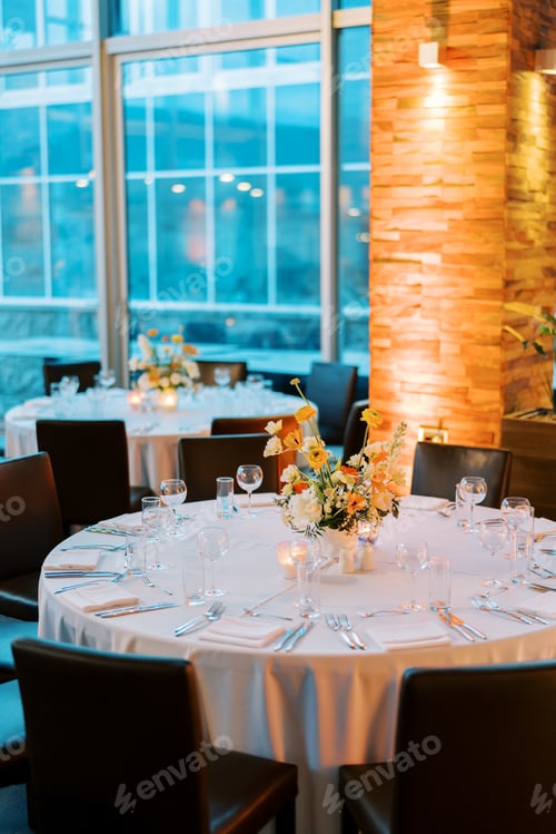 Preview: Set festive table with a bouquet of flowers in a restaurant