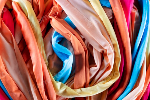 Preview: A group of multicolored cloth drapes