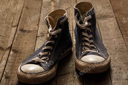 Preview: Gumshoes on wooden background