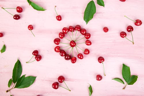 Preview: Ripe cherry berries and cherry leaf