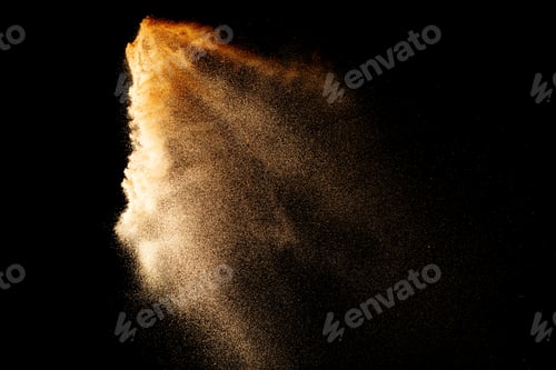 Preview: Sand flying explosion isolated on black background ,throwing freeze stop motion object design.
