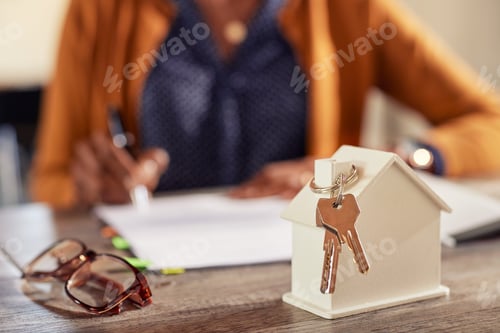 Preview: Woman signing contract for real estate purchase