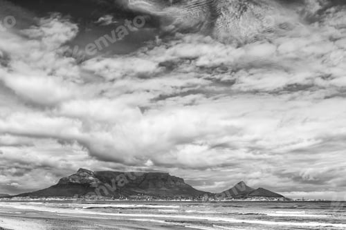 Preview: Table Mountain seen across Table Bay from Dolphin Beach. Monochrome