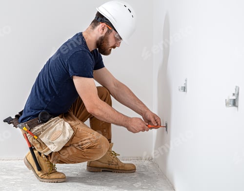 Preview: Electrician Builder at work, installation of sockets and switches.