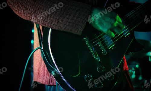 Preview: A guy playing a guitar