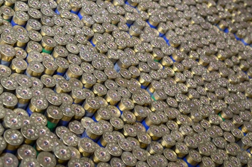 Preview: Pattern of 12 gauge cartridges for shotgun bullets. Shells for hunting rifle close up