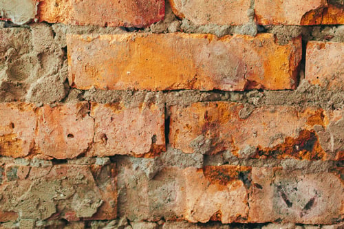 Preview: Old weathered brown brick wall for background