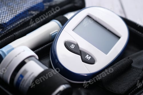 Preview: Close up of diabetic measurement tools in bag on table