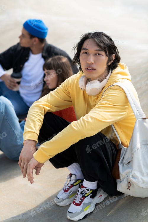 Preview: Young friends find joy together in the sun while relaxing outdoors on a sunny day