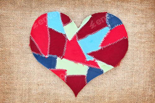Preview: fabric scraps heart on texture grunge background. Valentine's Day