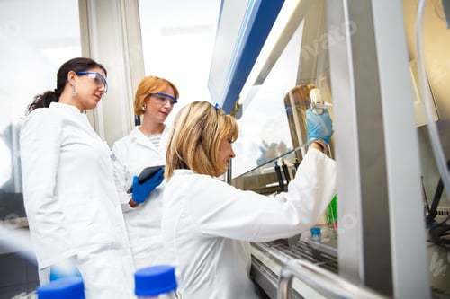 Preview: Photo of real female scientists researching in laboratory.