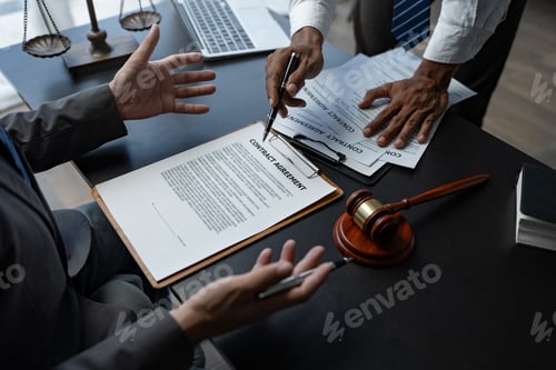 Preview: Attorneys or lawyer reading statute of limitations, consulting between male lawyers and business cli