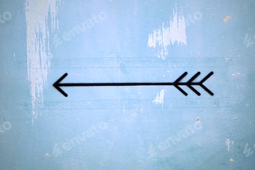 Preview: Black artistic arrow drawing on the wall