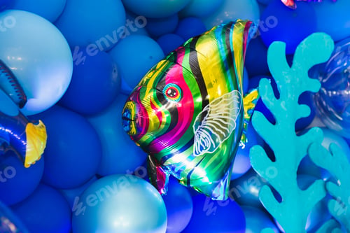 Preview: Marine-style decor of balloons, fish, and corals for the birthday photo zone