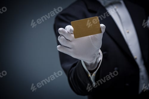 Classy Presentation: White-Gloved Hand Offering a Card