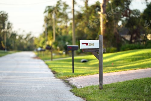 Preview: Typical american outdoors mail box on suburban street side