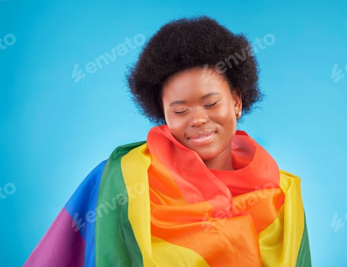 Preview: Rainbow, happy and black woman with lgbtq flag in studio for gay community, queer rights and homose