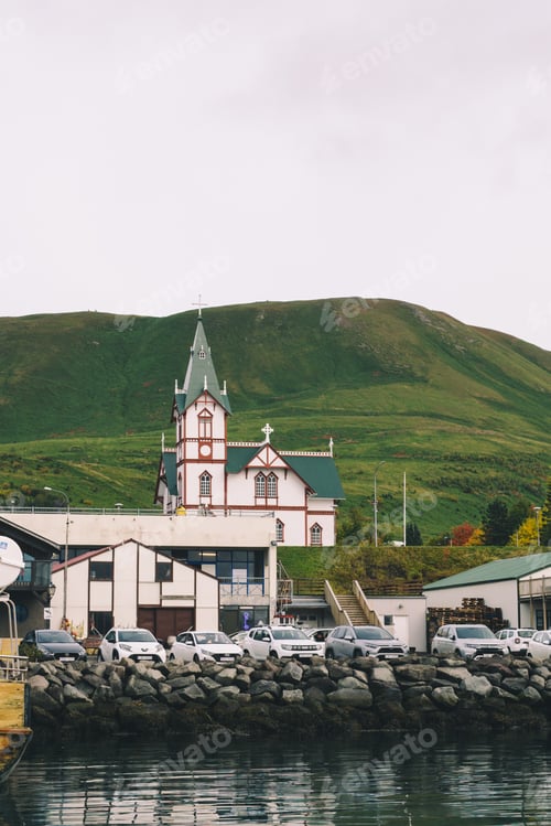 Preview: View on the church in Husavik with a mountain on the background