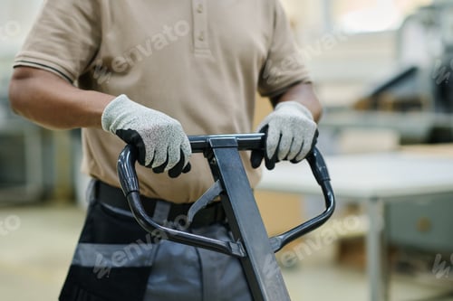 Preview: Unrecognizable Worker With Pallet Jack