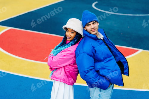 Preview: Multiracial young couple of lovers dating outdoors in winter