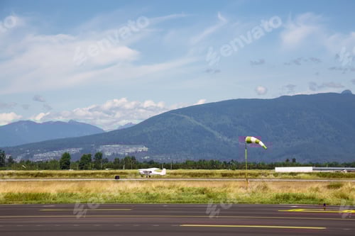 Preview: Pitt Meadows Airport during a sunny summer day