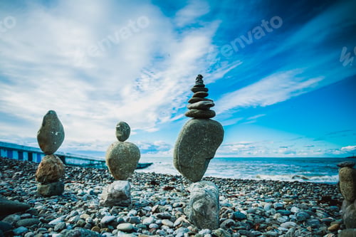 Preview: Stack of balanced stones on the beach