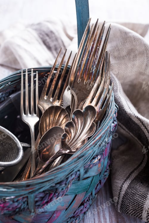 Preview: Vintage cutlery in old blue wicker basket