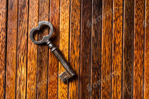 Preview: the old key lies on an old wooden table, natural textures, the concept of discoveries, secrets