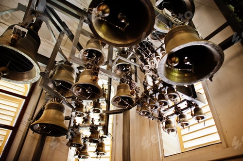 Preview: Close-up view of metal orthodox church bells in tower.