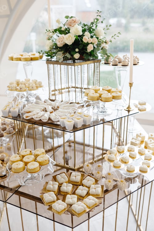Preview: Delicious desserts decorating a wedding reception table